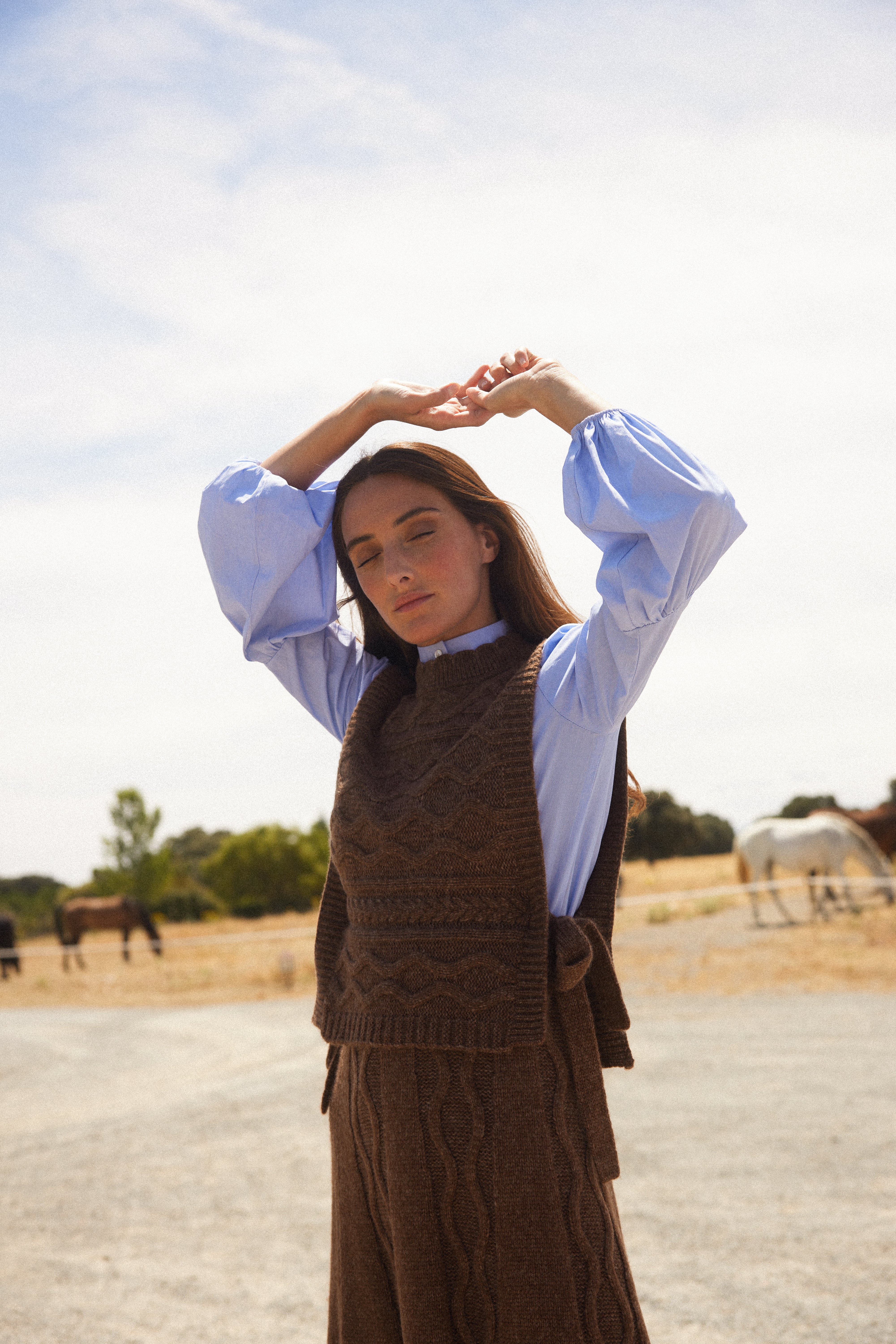 Colete castanho de oito pontos