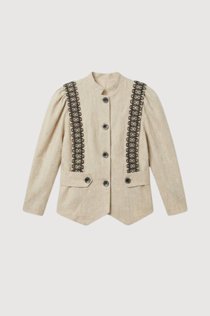 Chaqueta en color crema con hilatura dorada y manga larga abullonada. 